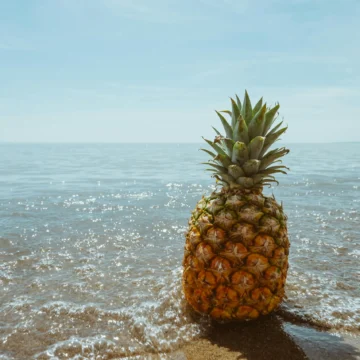 pineapple on a sandy beach